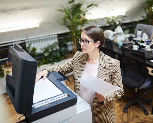 Woman using an OCR Scanning