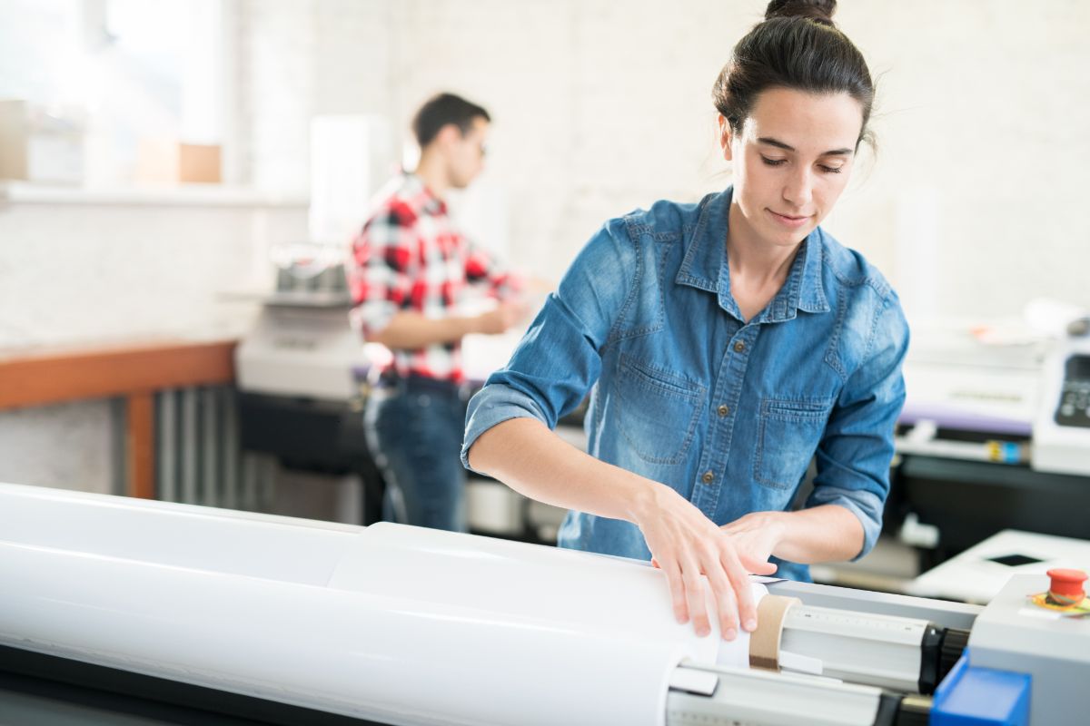wide-format-woman-using-sarasota Wide format printers for Sarasota Businesses