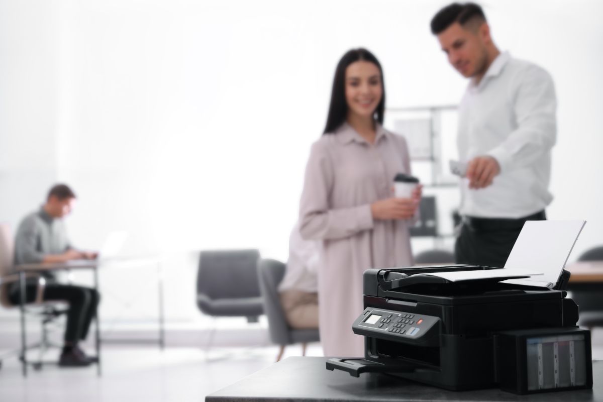Woman and Man standing in copier syracuse NY
