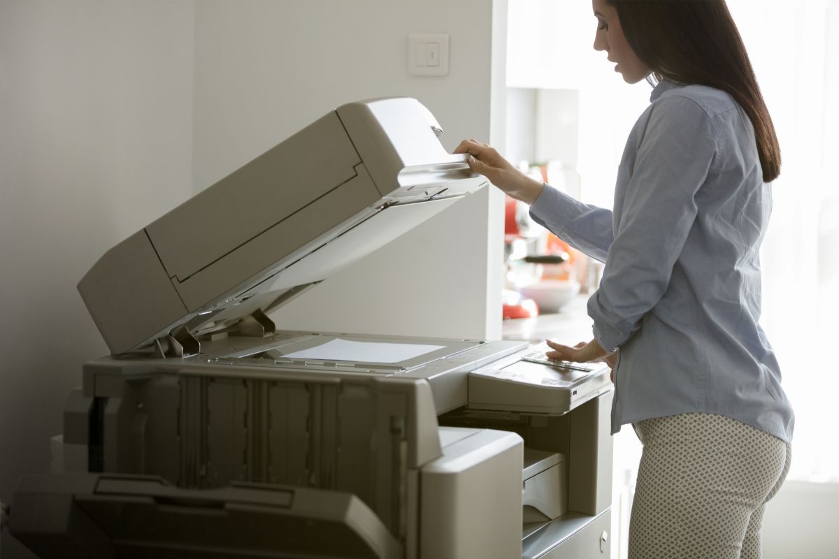 Woman using a copier in Pawtucket, Rhode Island