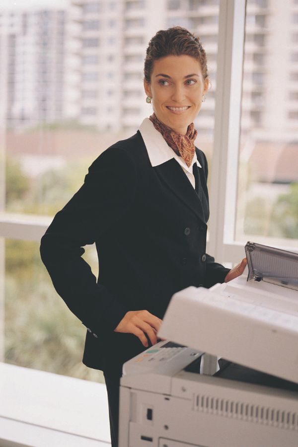 Woman leasing a multifunction printer